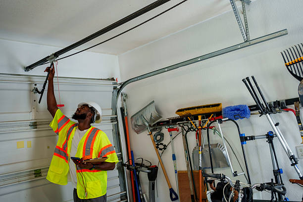 Professional Garage Door Panel Replacement technician working in Wells Branch, TX